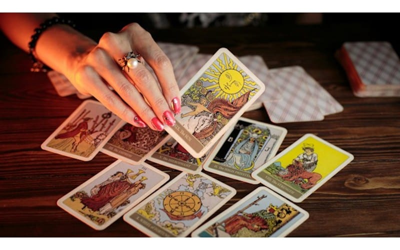 Discover the radiant symbolism and meaning of The Sun Tarot card. Explore its impact on love, career, and personal growth within the Major Arcana.